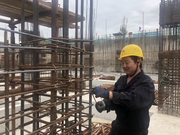 按下快門，定格建設(shè)施工一線最美身影